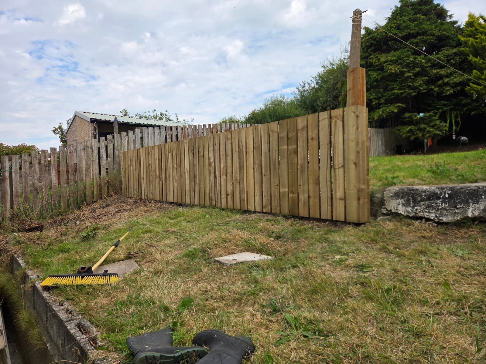 Replacement boundary fence run between gardens, West Lakes Fencing work near Main Street, Frizington CA26